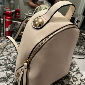 Tan Mini backpack.